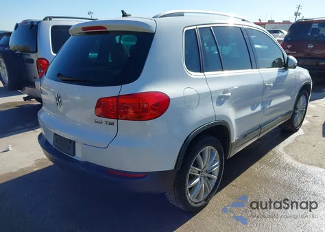 2014 Volkswagen Tiguan Sel z USA, uszkodzony, nr VIN WVGAV3AX2EW557592